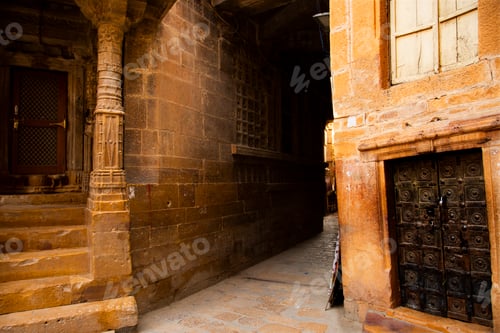 Preview: Old wooden doors of street houses in old town, Jaisalmer, India.