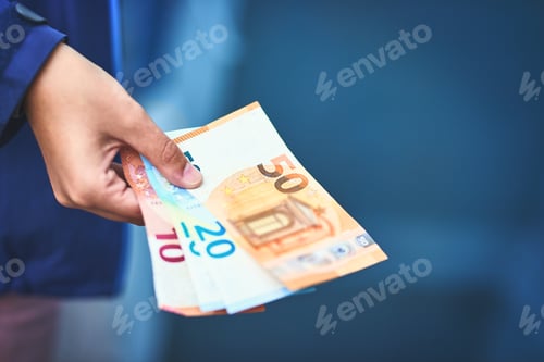 Preview: Whats your worth. Cropped shot of an unrecognizable woman holding paper currency.