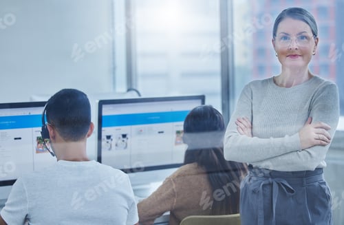 Preview: Shot of a female manager in the office with her staff members