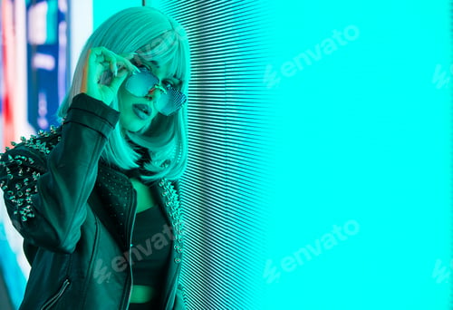 Preview: Beautiful woman illuminated by led lights