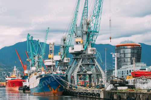 Preview: Old Barge Freight Ship Tanker And Heavy Loading Cranes Jib In Po