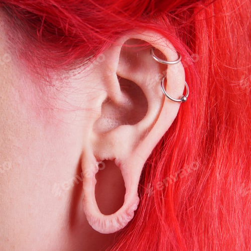 Preview: stretched ear lobe piercing