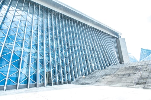Preview: Shenzhen, China - August, 2019: background of modern building, wall reflection with blue sky