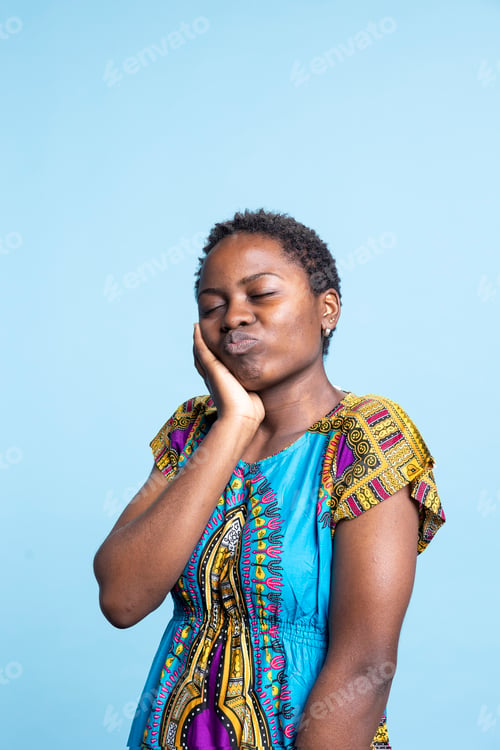 Preview: African American model making goofy faces for the camera,