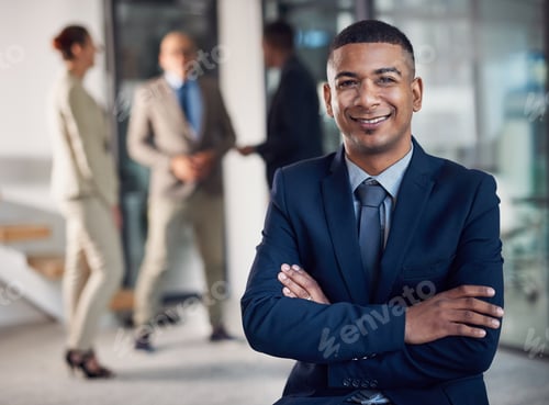 Preview: Ready for success. Portrait of a corporate businessman standing in an office.