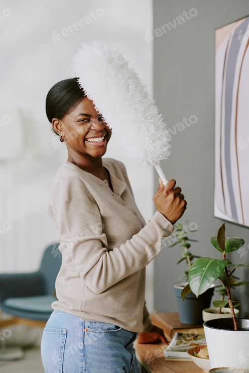 Preview: Portrait of Black Woman Cleaning Home for Household Chore Concept