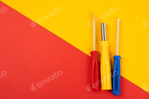 Preview: construction tools screwdrivers on double background repair equipment industry