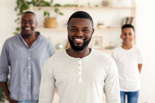 Preview: Three Generations. Smiling Black Father, Son And Grandfather Posing Standing At Home