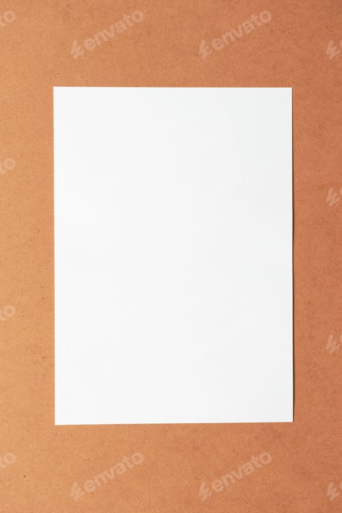 Preview: White empty clean paper sheet on cardboard background