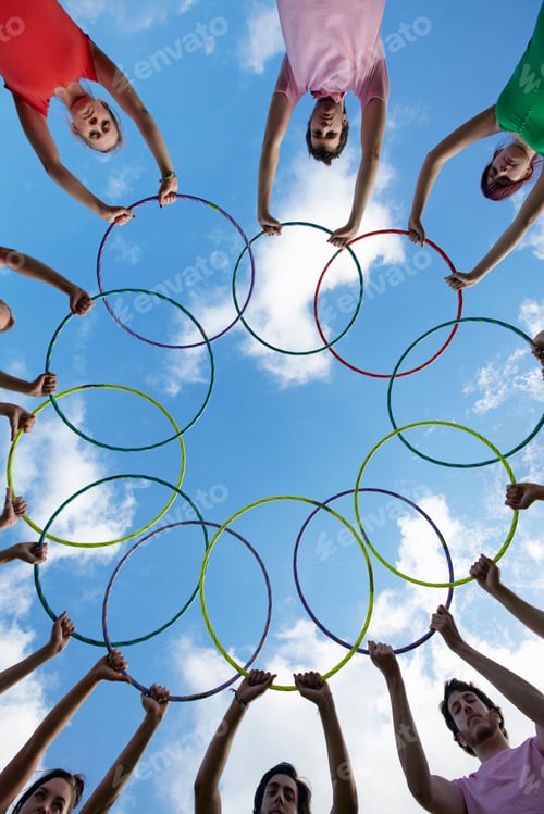 Preview: People holding hula hoops in circle