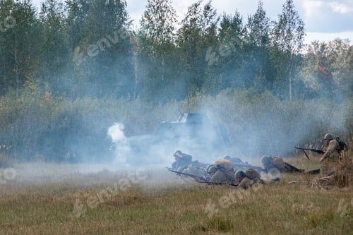 Preview: Battle of Soviet and German soldiers. Attack of Soviet soldiers and a smoking armored car