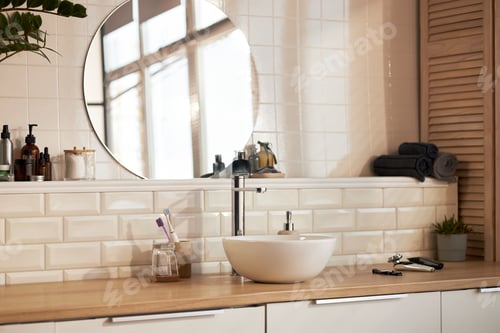 Preview: Modern Bathroom Countertop Displaying Skincare Products and Grooming Essentials