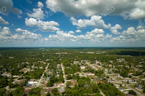 Preview: Aerial view of small town America suburban landscape with private homes