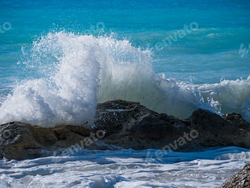 Preview: waves breaking on a stony beach