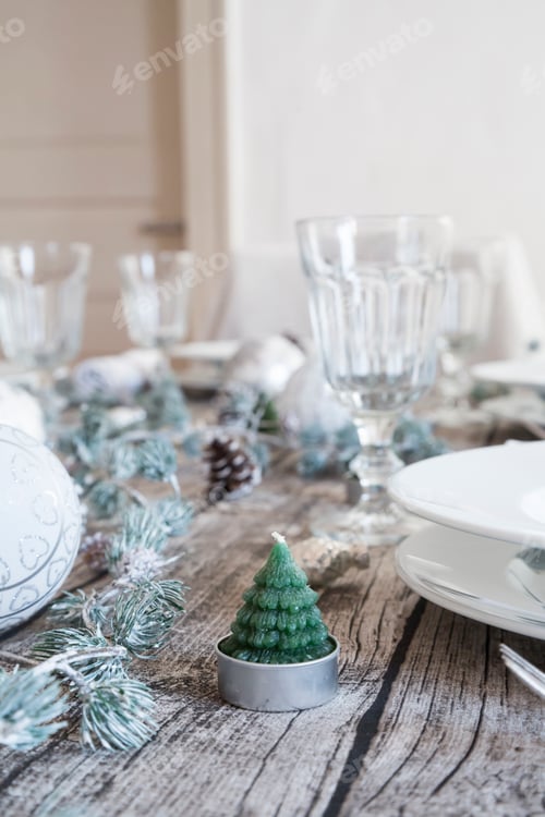 Preview: Tea light shaped like a fir on laid table at Christmas time