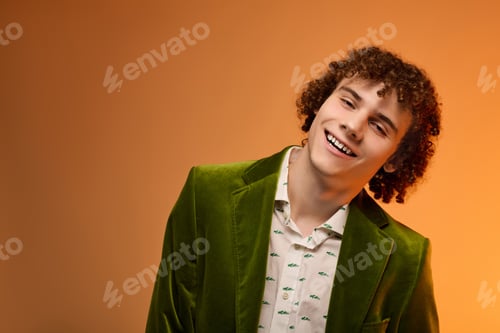 Preview: Curly teenager brings style in a vibrant green velvet blazer