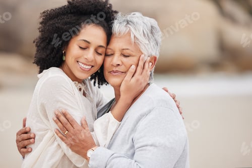 Preview: Women, mother and daughter on beach, hugging and smiling in embrace, love and happiness. Family vac