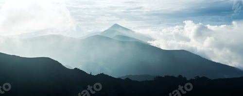 Preview: Layered Mountains with Figure in Fog