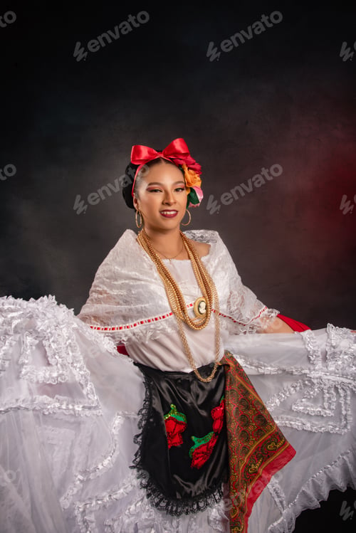 Preview: A woman in a white dress with a red bow on her head