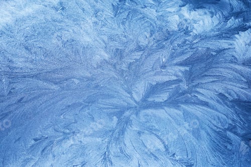 Preview: Frosty Patterns. Close-up of intricate frost designs on a blue surface,