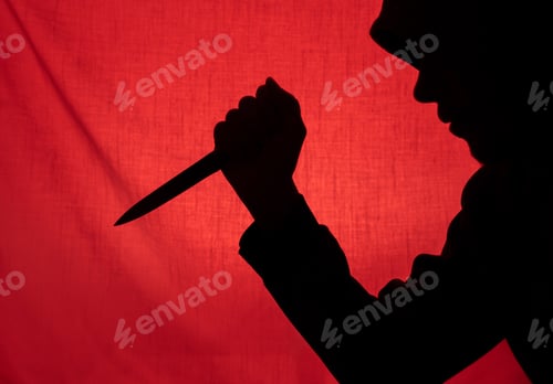 Preview: Man with a knife silhouette. Halloween and violence concept