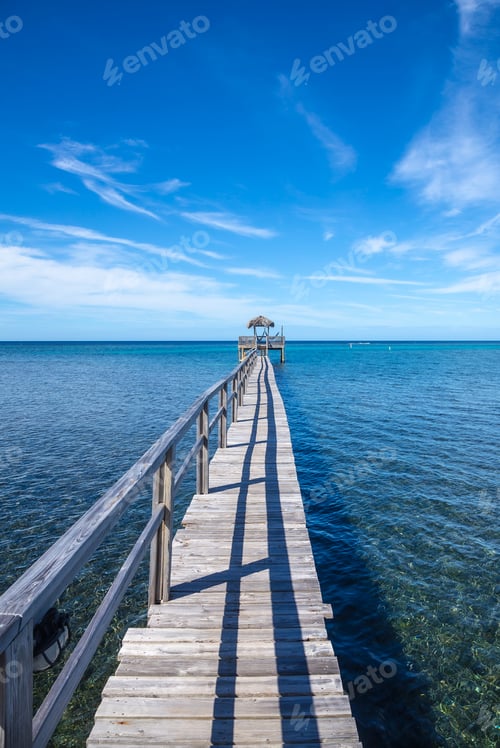 Preview: Wooden footbridge over the Caribbean Sea on Roatan Island. Honduras