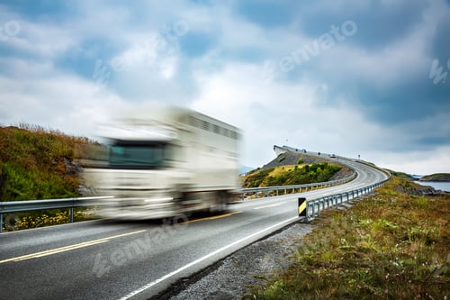 Preview: Truck and highway at sunset