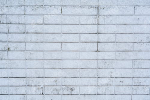 Preview: Close-up of a textured white brick wall