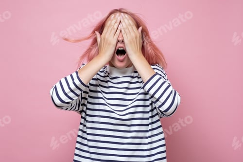 Preview: Girl covering eyes in surprise waiting for gift.