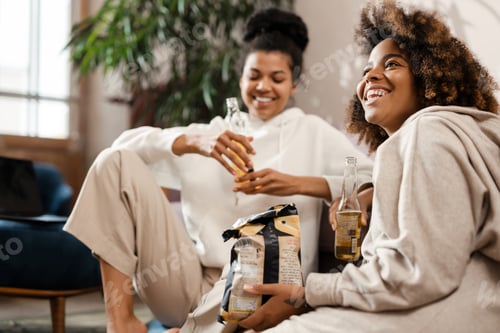 Preview: Two happy young african women friends