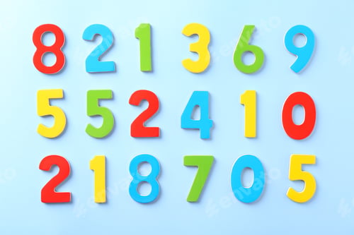 Preview: Colorful numbers on light blue background, flat lay