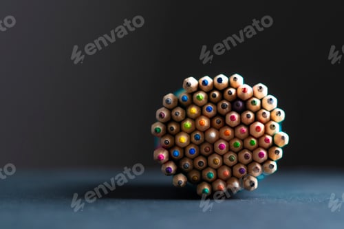 Preview: many colorful pencils in the shape of circle, pile of crayons, a view from above