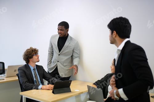 Preview: Coworkers are meeting at office.