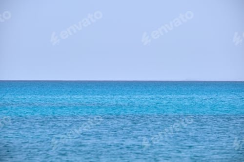 Preview: Closeup seascape surface of blue sea water with small ripple waves.
