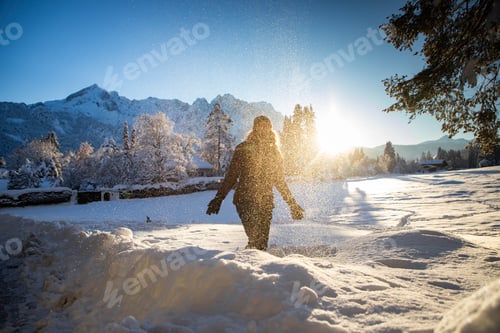 Preview: woman having fun in winter snow