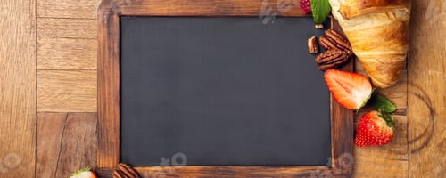 Preview: Black chalkboard with croissant and berries
