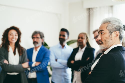 Preview: Multiracial business people working inside bank office - Focus on senior asian man