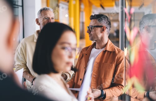 Preview: group of professional entrepreneurs communicate during work day in office