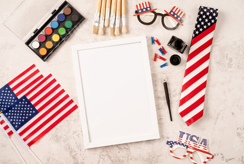 Preview: Blank frame for mockup design with USA independence day party elements top view flat lay