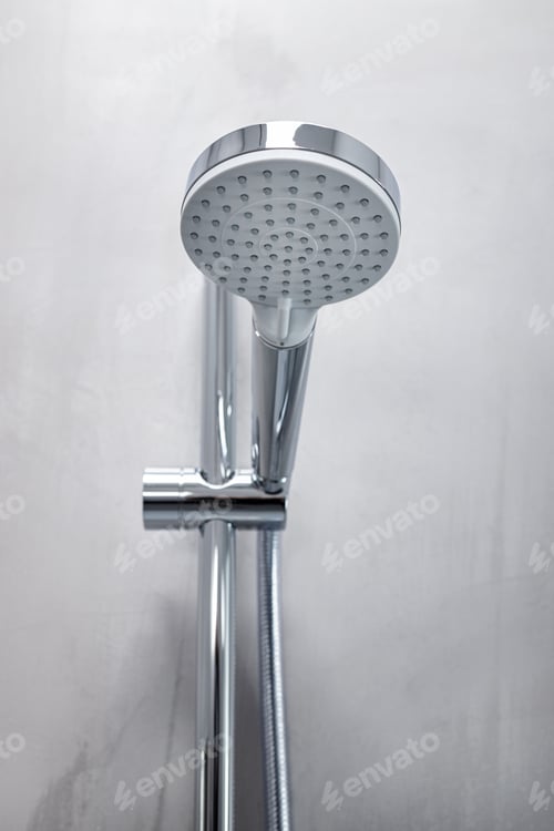 Preview: Shower head on a gray microcement wall