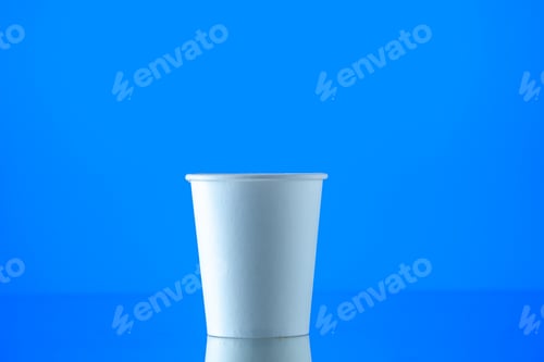 Preview: front view paper water cup on blue background