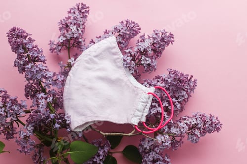 Preview: Reusable face mask with lilac flowers on pink background