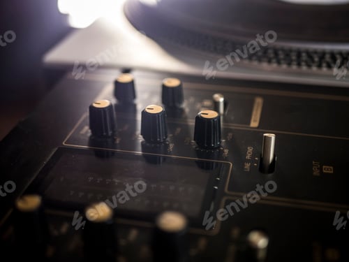 Preview: close up macro shot dj music audio equipment knobs on the mixer
