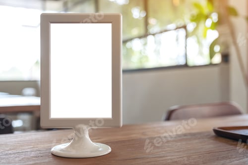 Preview: A blank menu sign on wooden table in cafe