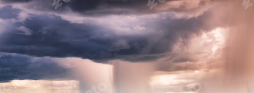 Preview: Heavy rainstorm in colorful stormy sky at evening