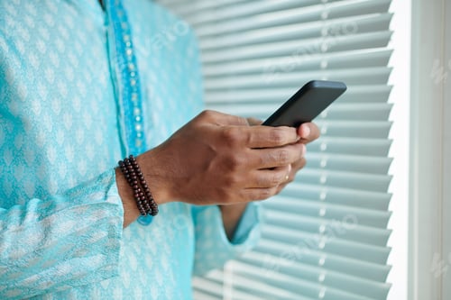 Preview: Indian Man Answering Text Messages