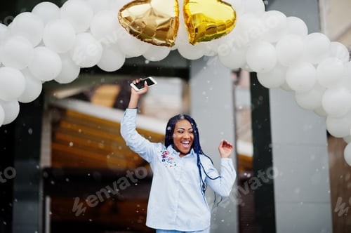 Preview: Stylish african american girl with dreads