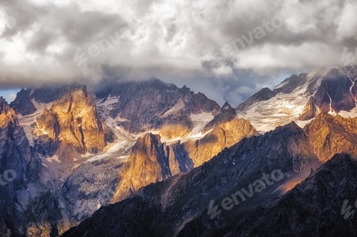 Preview: Detail of dramatic mountain range with colorful sunlight, Svaneti, Georgia