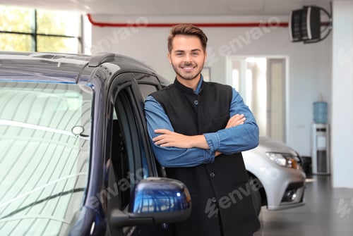 Preview: Young man near new car in dealership