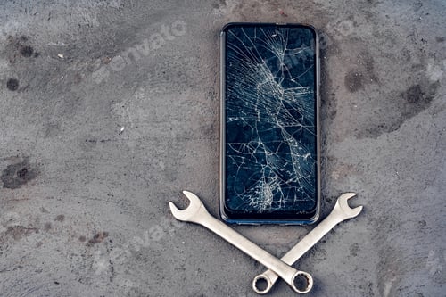 Preview: Smartphone repair concept. Damaged display of smartphone and tools